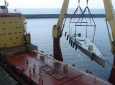 loading boat on the ship